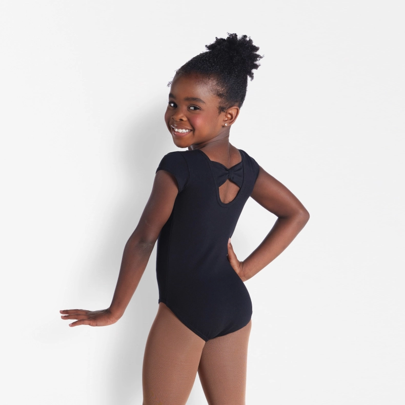 one model wearing kids leotard with present